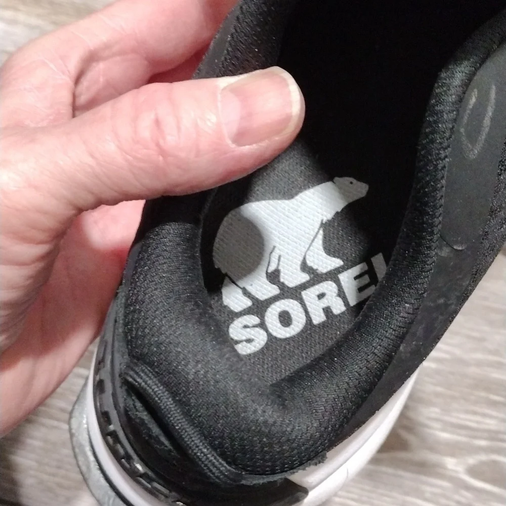 Sorel womens black leather and black mesh sneakers. Mint condition. Size 9